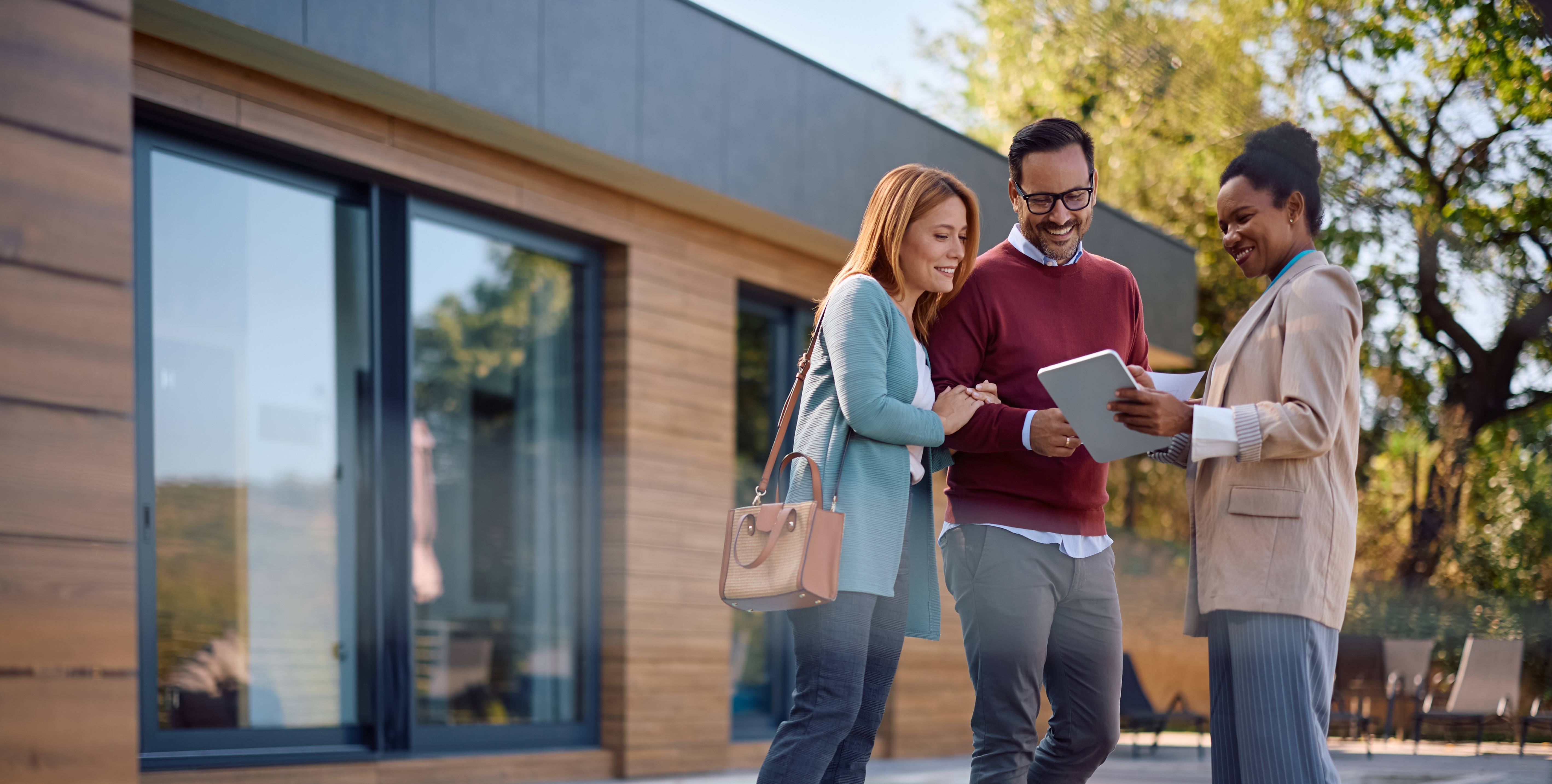 Real estate agent advising clients